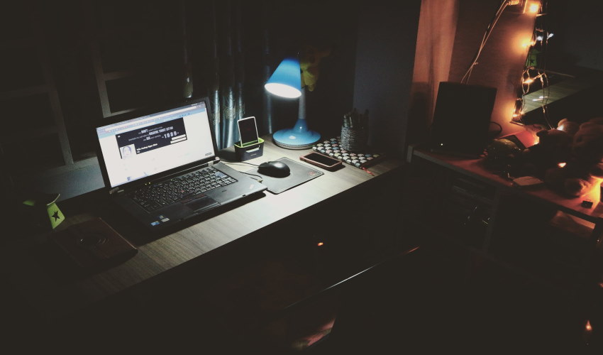 Dark Room with laptop